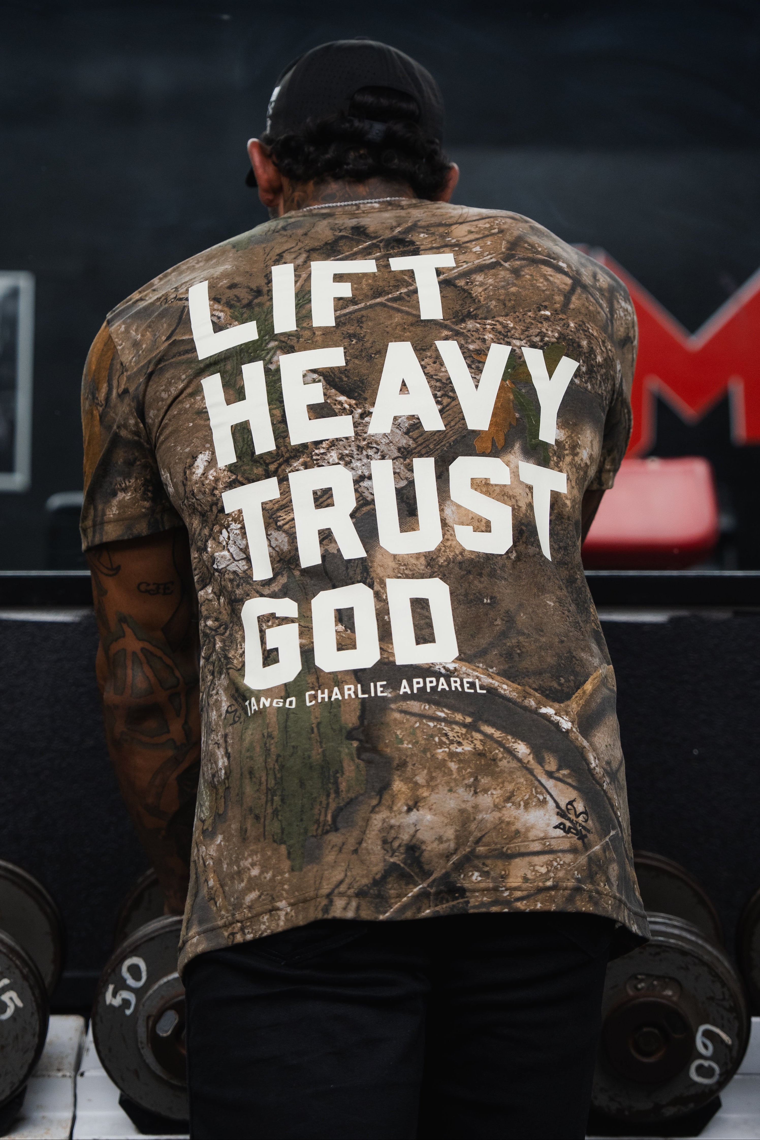 Lift Heavy. Trust God. - Realtree Premium Camo Tee